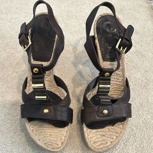 Stuart Weitzman sandals.